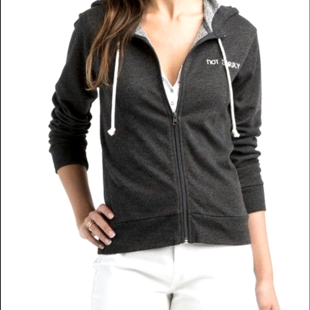 “Not sorry” zip up